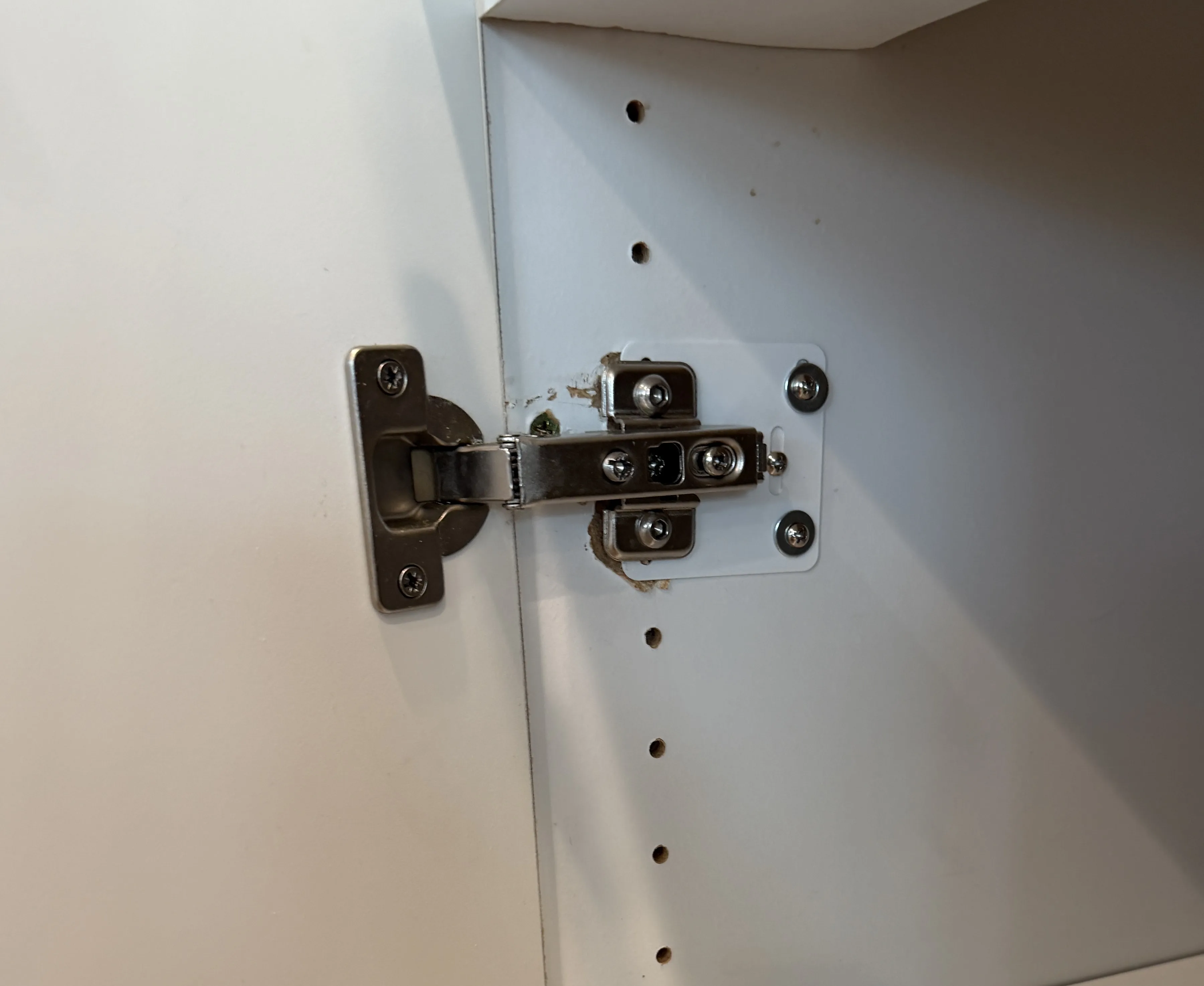 After cabinet hinge repair Irvine CA