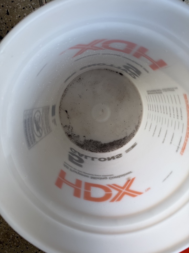 Sediment collected from a heavily scaled tankless water heater during a flush — Irvine CA
